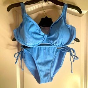 Never worn. Target brand xhilaration. Women’s baby blue 2-piece swimsuit.